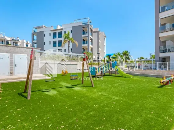 (13) Nowoczesny apartament w Villamartin | Taras dachowy | Prywatne miejsce w garażu | 3 baseny | Korty