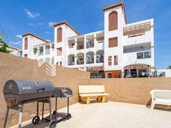 Penthouse w La Ciñuelica, Punta Prima z prywatnym tarasem dachowym i jacuzzi 1